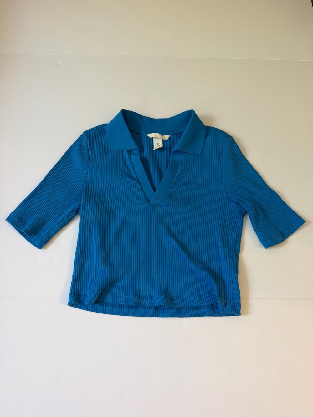 Women’s Blue Ribbed Polo Top